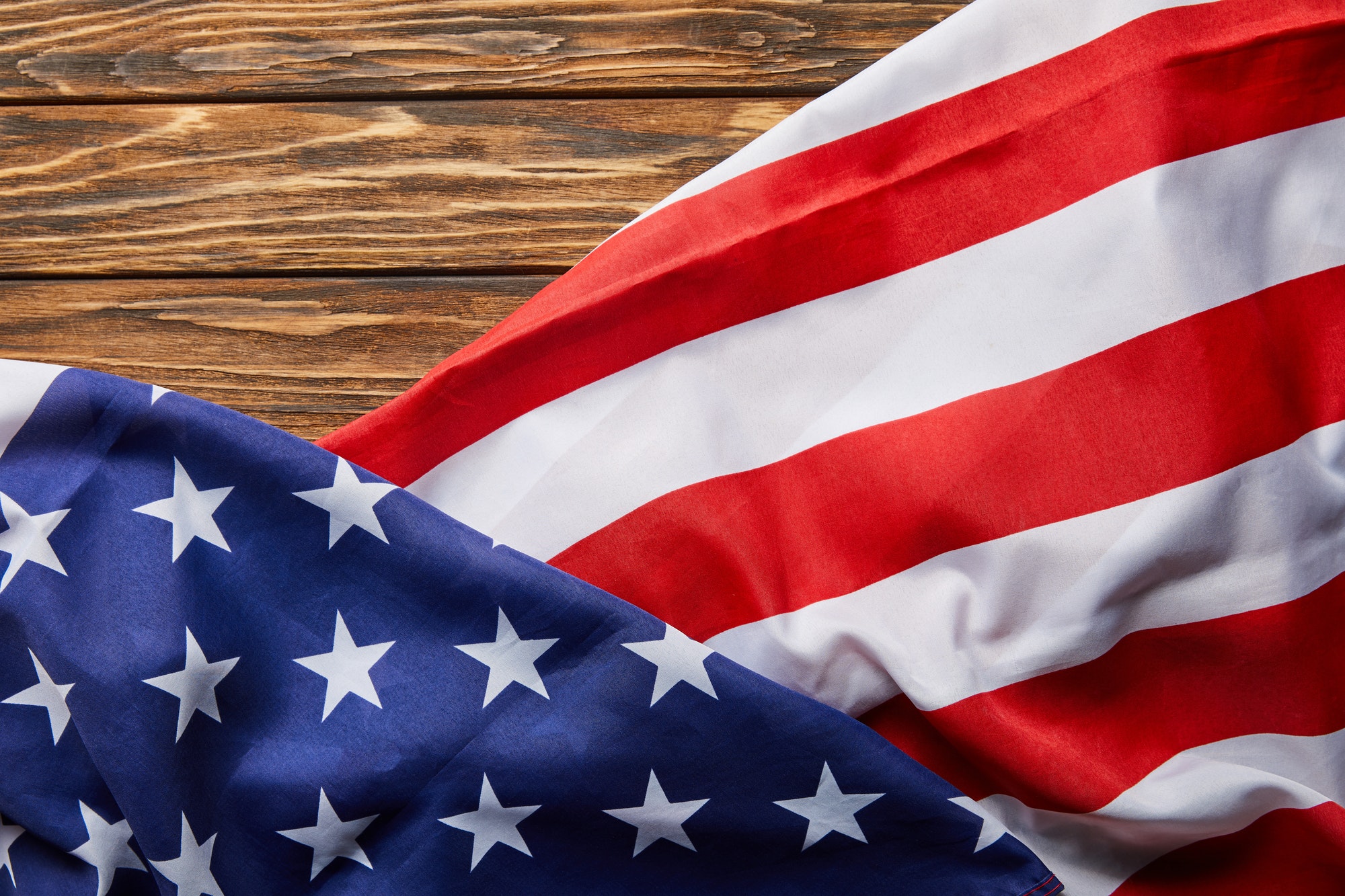 Top View of Usa Flag on Wooden Surface With Copy Space